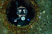 young-teenage-female-diver-exploring-the