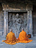 Monks praying Ajanta Caves - Stock Image