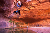USA, Utah, Grand Staircase-Escalante National Monument, Neon Canyon, Tourist in Golden Cathedral - Stock Image
