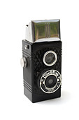 Vintage photographic film camera antique on white cut out. The Clix-O-Flex pseudo TLR camera was made by Metropolitan - Stock Image