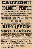An 1851 poster warning the 'colored people of Boston' about policemen acting as slave catchers - Stock Image
